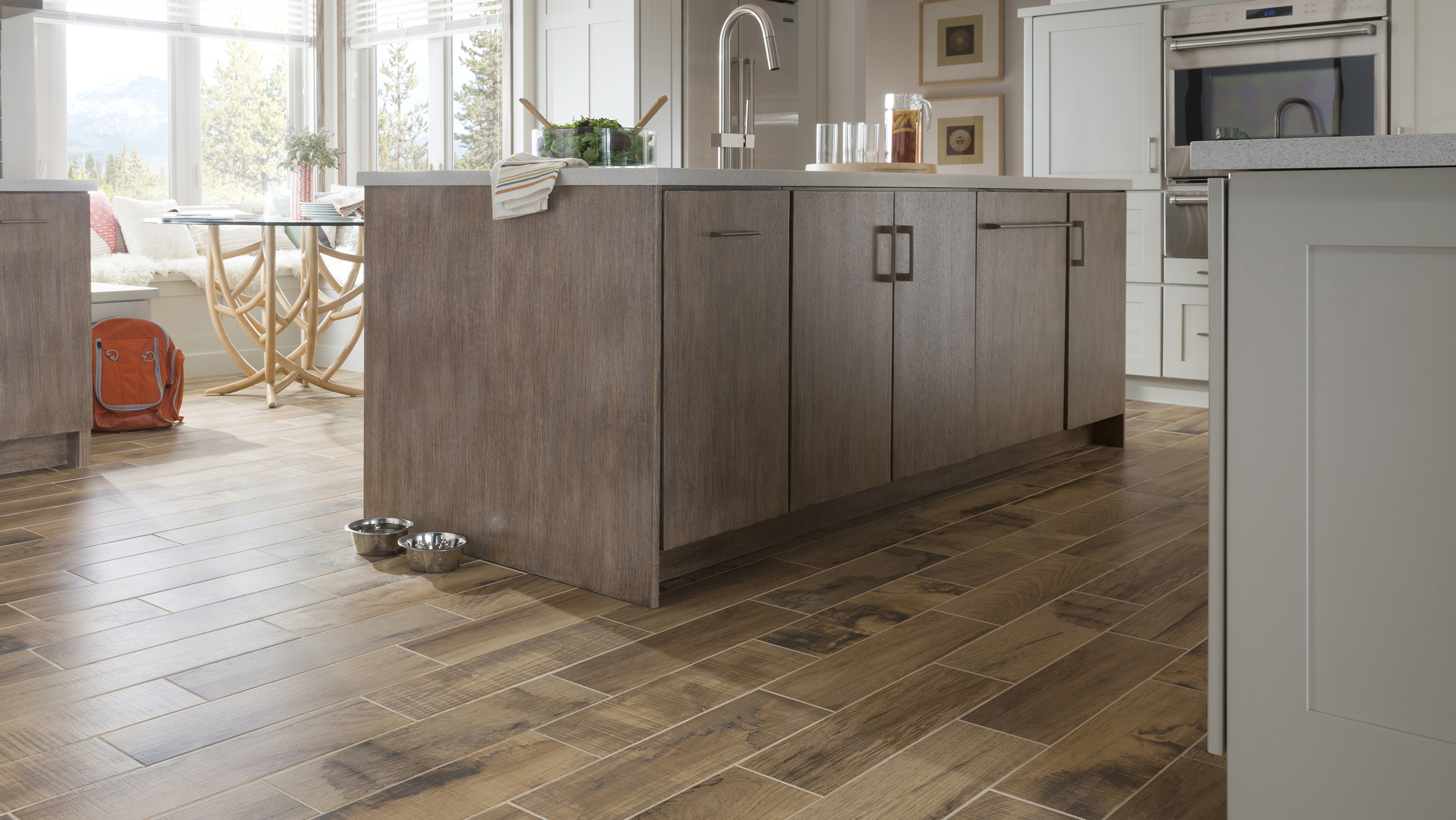 Wood-look tile in a kitchen, installation services available.
