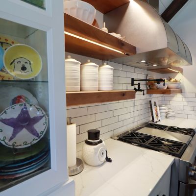 kitchen remodel with open shelving and custom cabinets