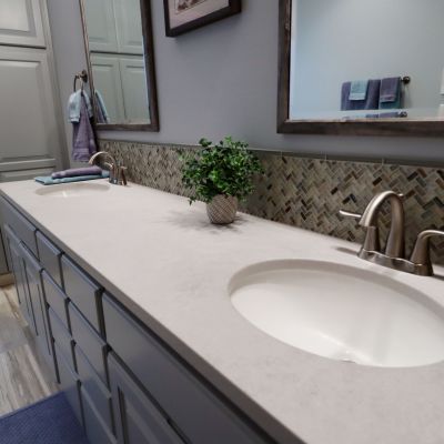 bathroom countertops in Lawrence KS with sink and blue vanity